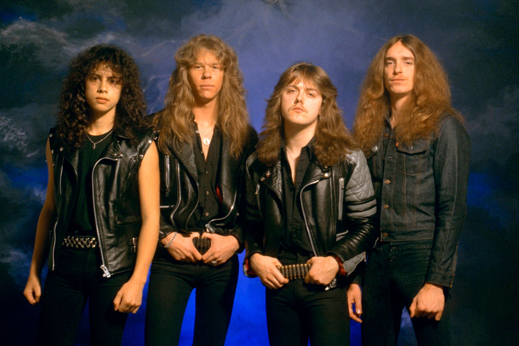 UNITED KINGDOM - JANUARY 01: Photo of Cliff BURTON and METALLICA and Kirk HAMMETT and James HETFIELD and Lars ULRICH; L-R: Kirk Hammett, James Hetfield, Lars Ulrich, Cliff Burton - posed, studio, group shot (Photo by Fin Costello/Redferns)